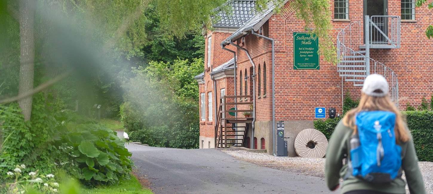 Hiker take a walk at the scenic Sulkendrup Mill